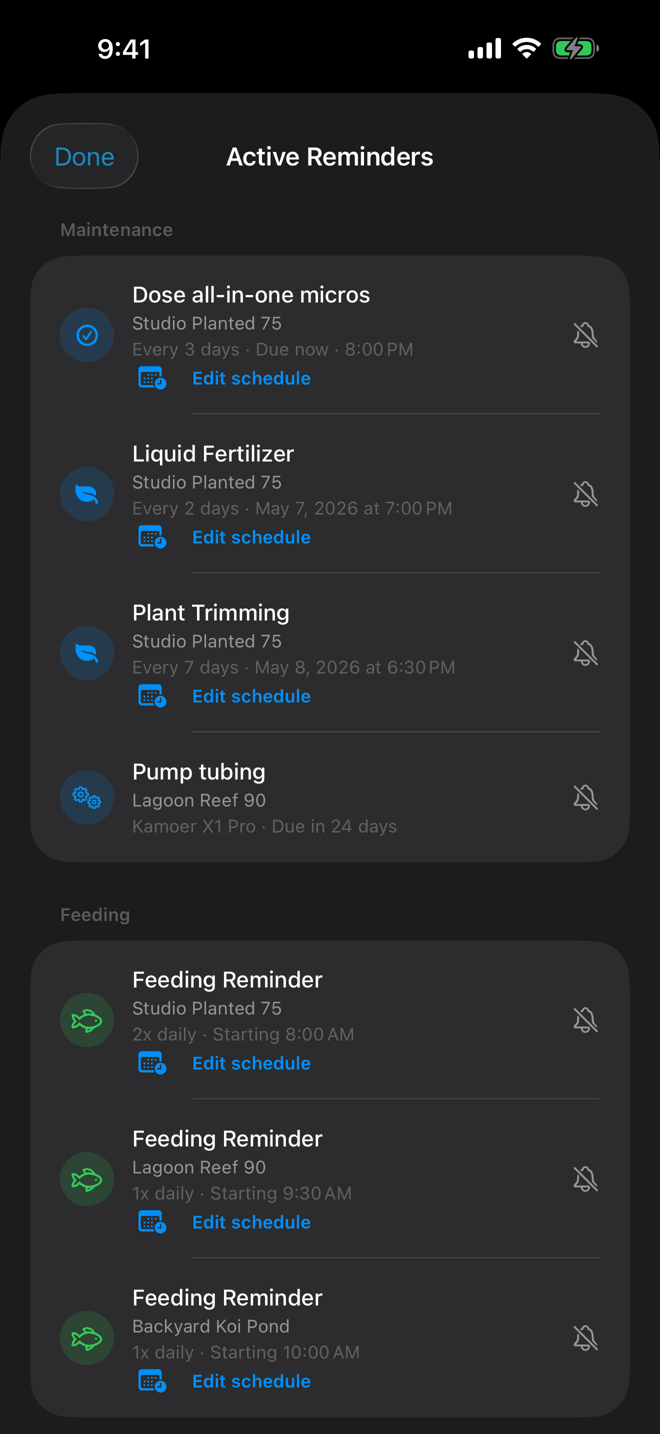 TankForge simulator screenshot showing active feeding and maintenance reminders across tanks before travel
